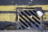 Double yellow lines painted underneath car