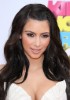 Kim Kardashian frolics in bikini on beach holiday