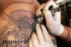 Woman 'left steaming' after tatt-poo